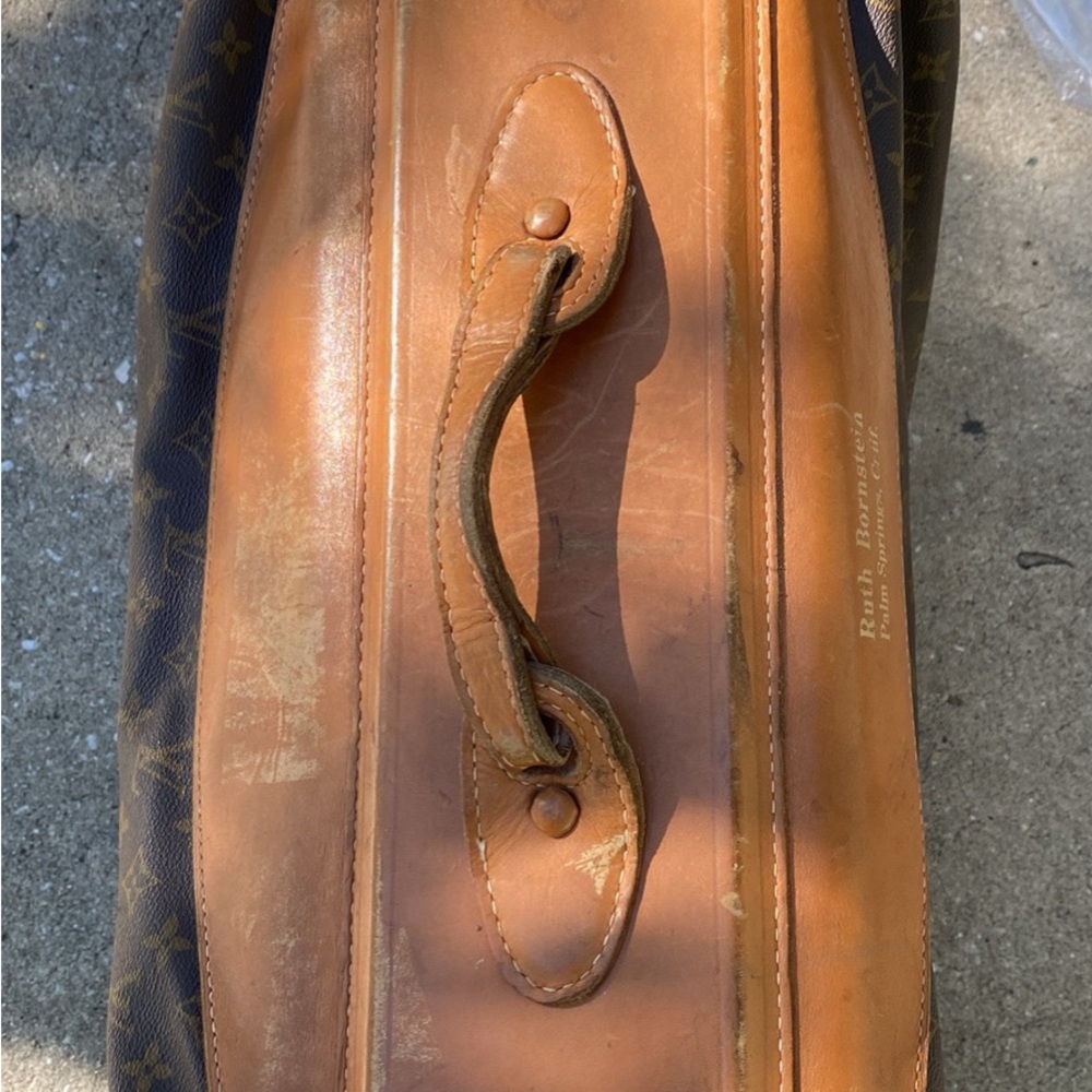 Louie Vuitton. Older luggage. In great shape.
